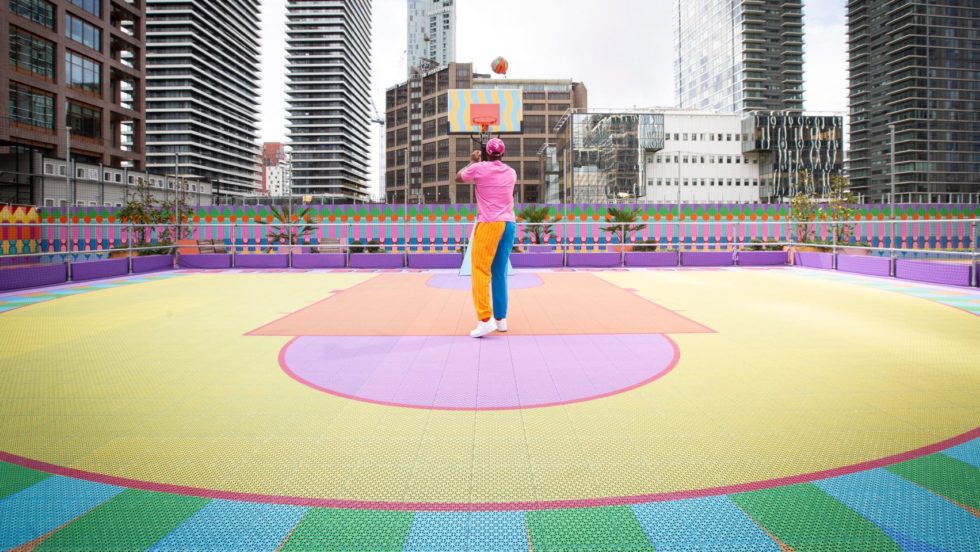Yinka Ilori 3D prints Canary Wharf basketball court in rainbow colours