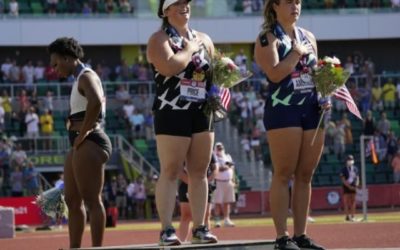 Hammer Thrower Gwen Berry Turns Away from Flag During Anthem